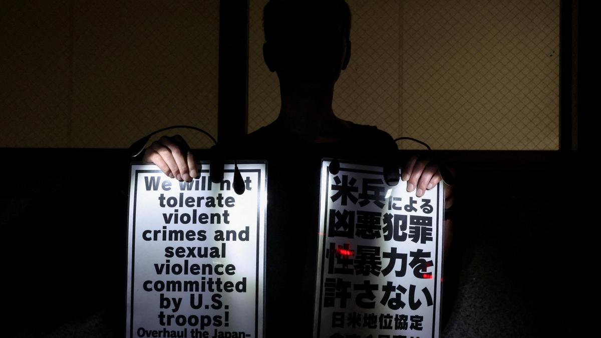 US Marine arrest over Okinawa woman's killing prompts protests and troop restrictions