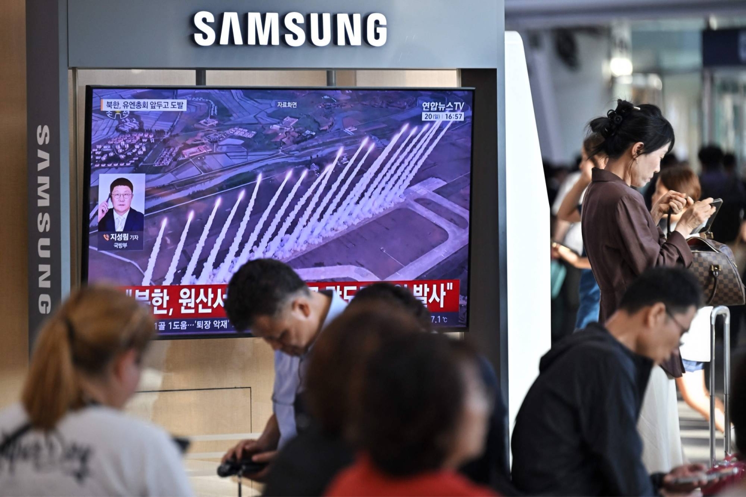 North Korea fires ballistic missiles, then reports submarine cruise missile tests