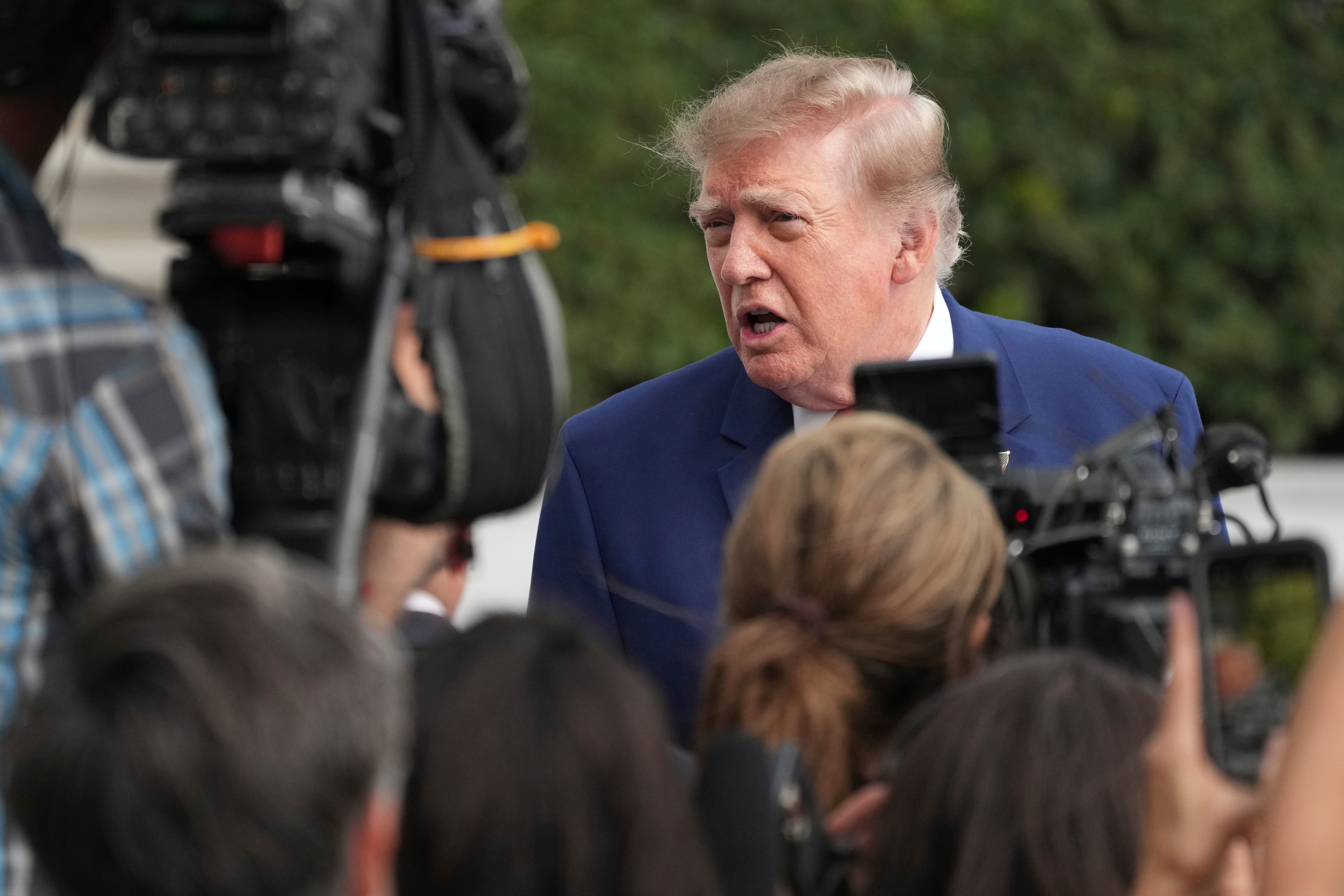Trump defends Russia sanctions waiver as bipartisan criticism grows in Congress