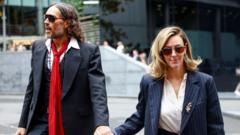 Russell Brand's Wife Testifies as Rape and Sexual Assault Trial Continues